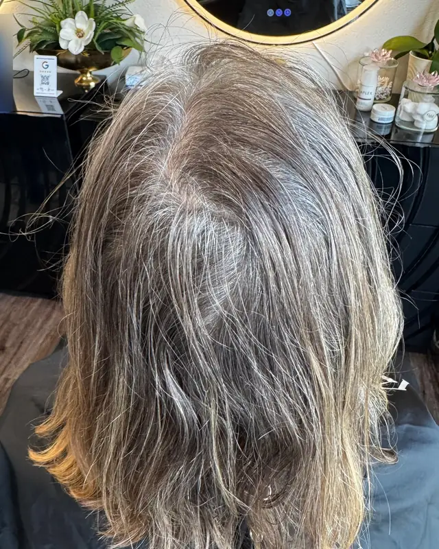 Before: grown-out gray roots with brassy, uneven ends