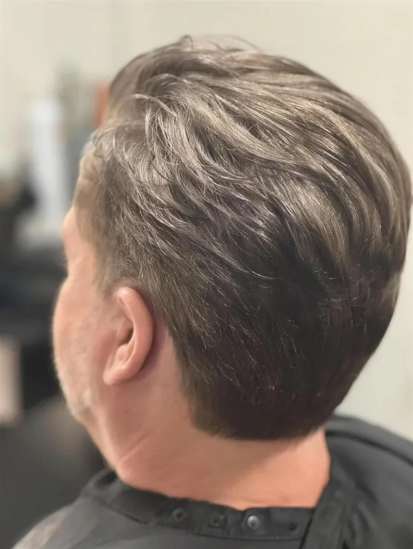 Men’s haircut, tapered and textured on top