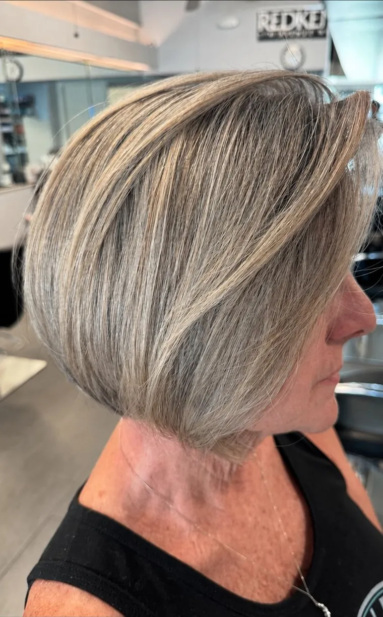 Dimensional highlights on a chin-length bob at Hair by Heidi